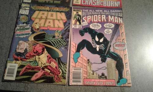 SUPERMAN ,BATMAN,SPIDERMAN, AND IRON MAN COMIC BOOKS.