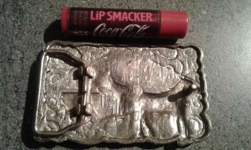 COCA COLA BERGAMOT 1976 75 TH ANNIVERSARY 1901--1975 BRASS BELT BUCKLE. LIP BALM.