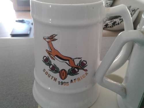 1995 Springbuck Rugby Glory.Official beer mug and 1995 Mug and Ice bucket. (player photos).