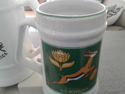 1995 Springbuck Rugby Glory.Official beer mug and 1995 Mug and Ice bucket. (player photos).