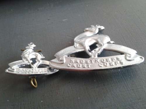 CADET CORPS SMALL AND LARGE CAP BADGES. SCARCE BADGES SINCE DOING AWAY WITH THE SCHOOL CADETS.