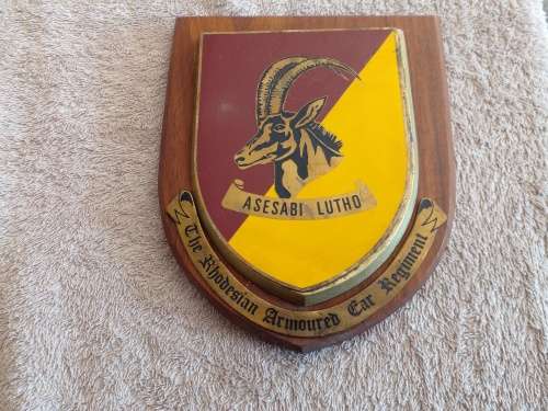 The Rhodesian Armoured Car Regiment wooden plaque emblem.