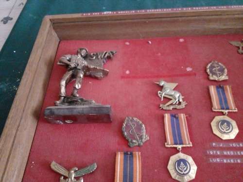 A Salute to 5 Bush War SADF. soldiers,with their unit badges and Pro Patria medals for Border duty.