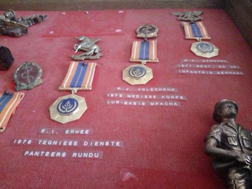 A Salute to 5 Bush War SADF. soldiers,with their unit badges and Pro Patria medals for Border duty.