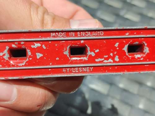 Antique lesney bentley and evening news van with feul stands made in england