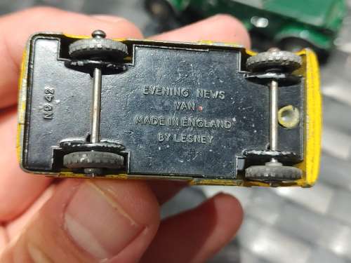 Antique lesney bentley and evening news van with feul stands made in england