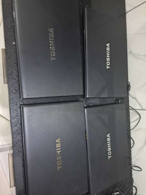 4x Toshiba icore 7 laptops new 500gb hardrive  all for one bid