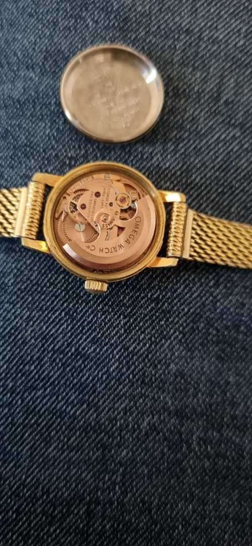 1945 omega automatic geneve 566.002 ladies watch with Fischer 14kt rolled gold strap