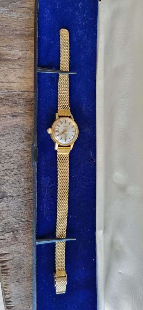 1945 omega automatic geneve 566.002 ladies watch with Fischer 14kt rolled gold strap