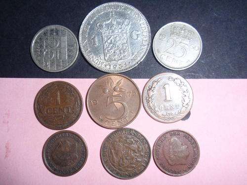 A LOT OF NINE NETHERLANDS COINS INCLUDING A  1931 ONE GUILDER1