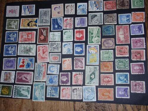 68 CANADIAN AND ONE NEWFOUNDLAND STAMPS INCLUDING A NUMBEROF HIGH VALUE ITEMS