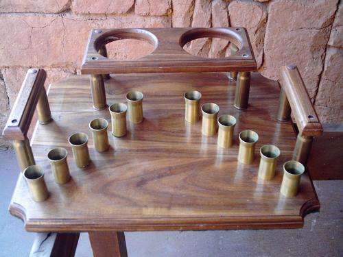Shots tray with bullet shell (50 caliber?) shot glasses and 2 shot bottle holders