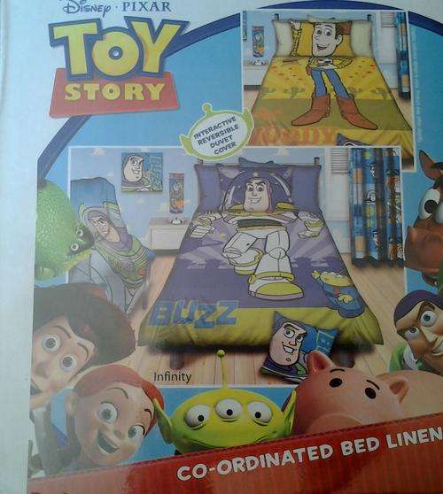 NEW! INTERACTIVE REVERSABLE CHILDREN TOY STORY BEDDING. GREAT FOR X-MAS!!!!!