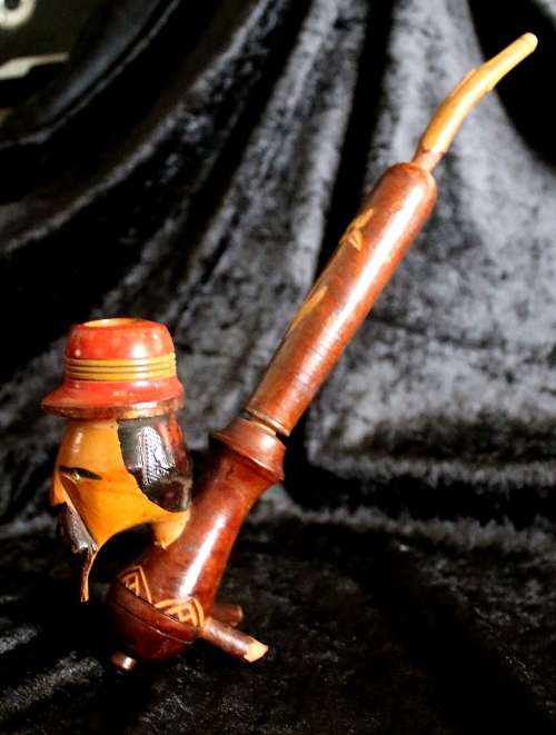 Vintage African carved wooden pipe unused