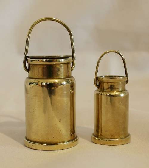 Two miniature brass urns (one with lid)