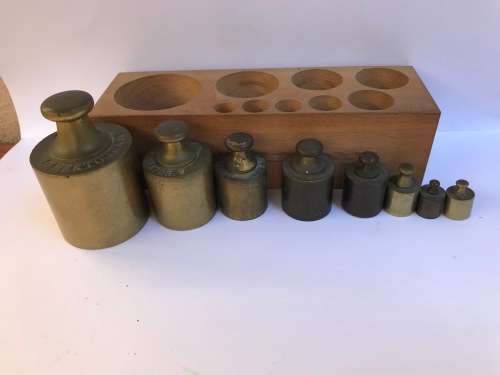 Antique brass weights