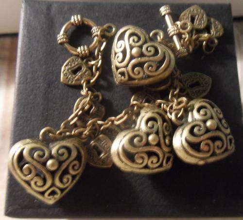 Gold bracelet with hearts