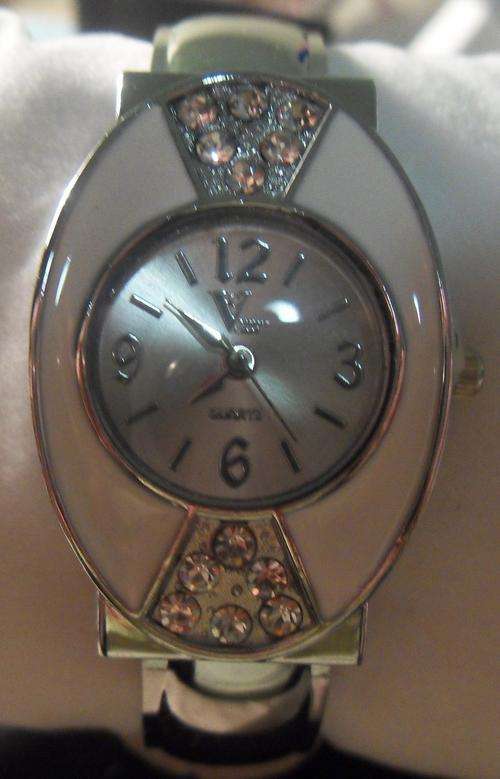 Silver watch with white and diamonds