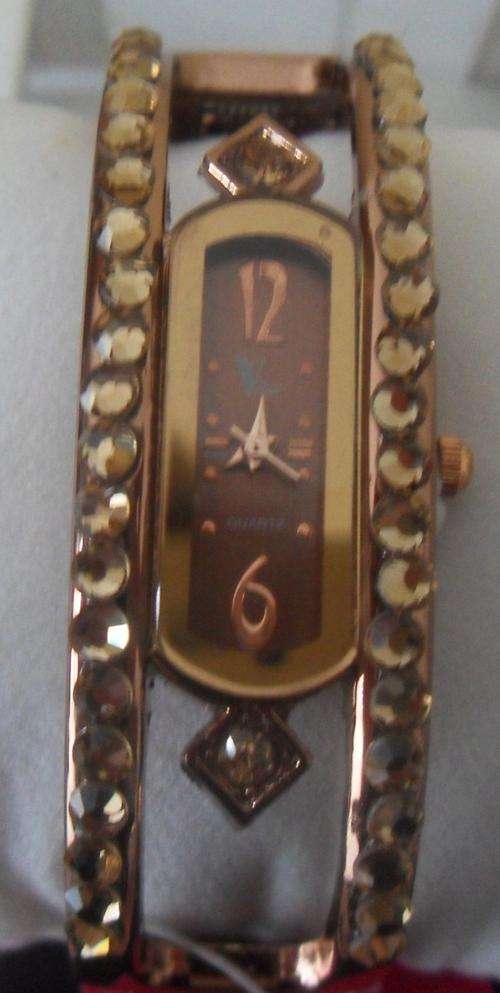 Bronze watch with bangle style