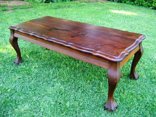 OLD OAK BALL AND CLAW COFFEE TABLE IN NICE CONDITION