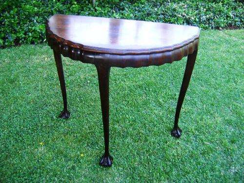 GREAT BALL AND CLAW HALFMOON TABLE