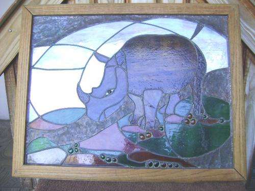 OLD OAK FRAMED LEAD GLASS AND COPPER RHINO WALL HANGING