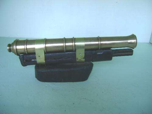 VINTAGE SOLID BRASS  CANNON ON AN EX-MAUSER STOCK  BASE