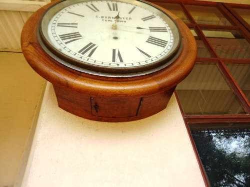 ANTIQUE MAHOGANY STATION CLOCK CASE CONVERTED TO BATTERY.