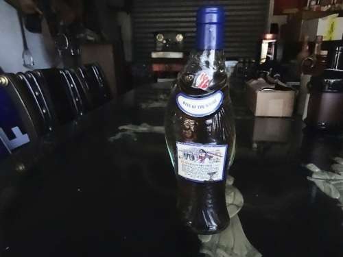 VINTAGE SEALED WINE OF THE WHARF FISH BOTTLE