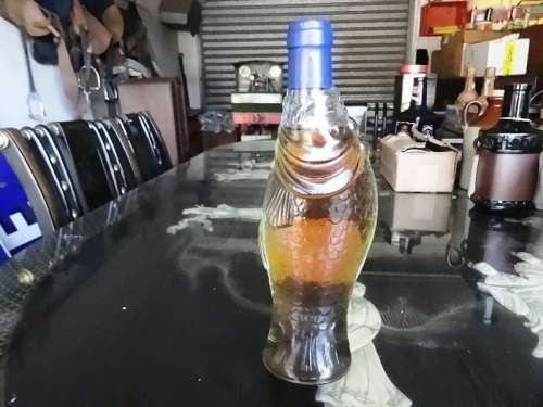 VINTAGE SEALED WINE OF THE WHARF FISH BOTTLE