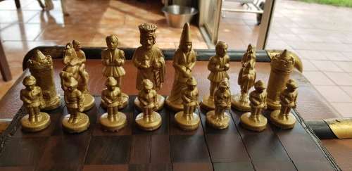 VINTAGE CAST IRON CHESS SET WITH BOARD