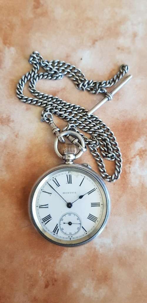 1909  ANTIQUE STERLING SILVER POCKETWATCH  CHAIN EXCLUDED