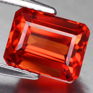 4.25ct.EMERALD CUT ORANGE SAPPHIRE SONGEA !