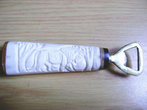 HAND CARVED OX-BONE LION BOTTLE OPENER