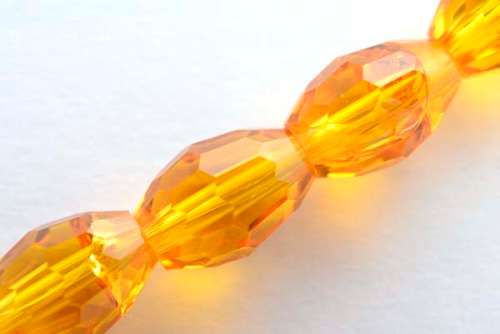 Facetted oval, gold, 8x10mm, 10pcs