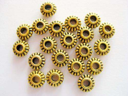 Spacer, fluted disc, gold tone, 6x3mm, 20pcs