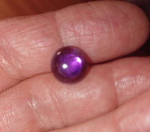 Sterling silver stud earrings with Amethysts. E56