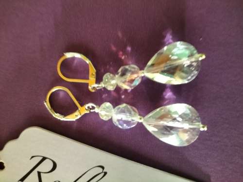 Sterling Silver huggies with large crystal drop. E69