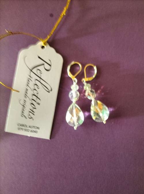 Sterling Silver huggies with large crystal drop. E69
