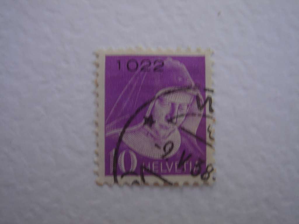 1935 Helvetia - Portofreimarke 10 used, stamped with control number `1022`
