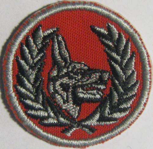 RED BADGE WITH WOLF
