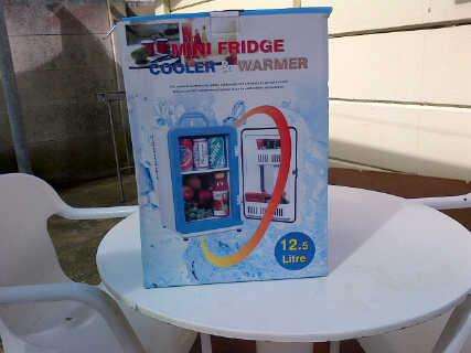 Mini fridge cooler + warmer brand new