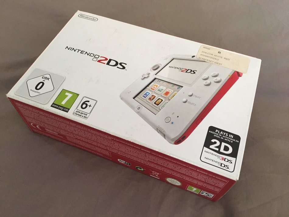 red & white Nintendo 2DS console complete