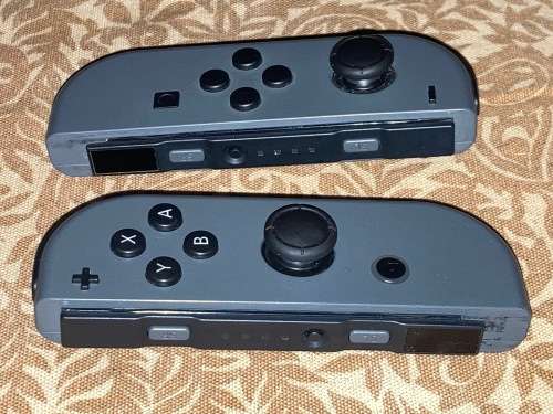 grey Nintendo Switch Joy-Con pair with Grip
