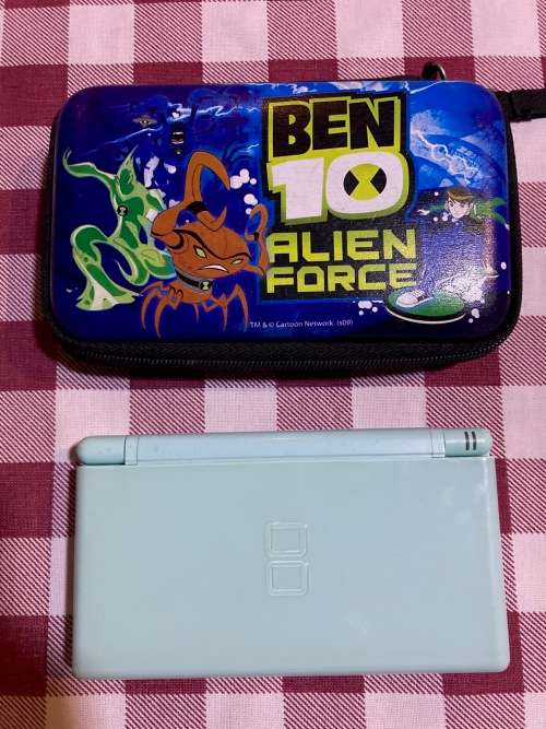 light blue Nintendo DS Lite with charger, stylus & case