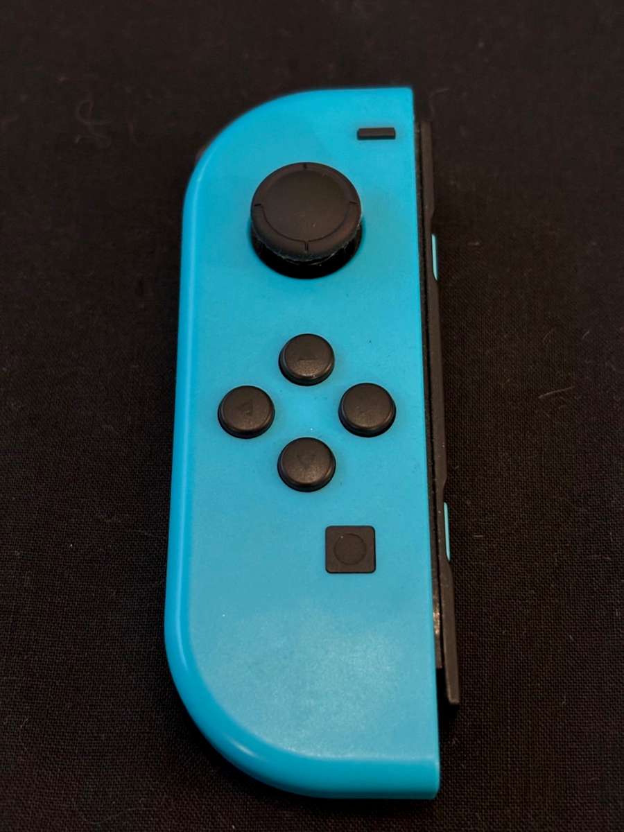 neon blue Left Joy-Con controller for Nintendo Switch with strap