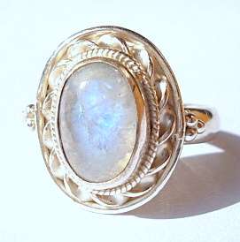 ** FLASHING BLUE MOONSTONE SET IN STERLING SILVER.925**
