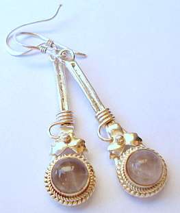 **ROSE QUARTZ SET IN SOLID STERLING SILVER.925**