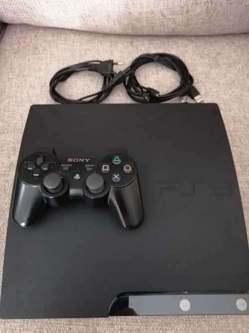 Sony Playstation 3 Slim Console (PS3), Controller and 27 games