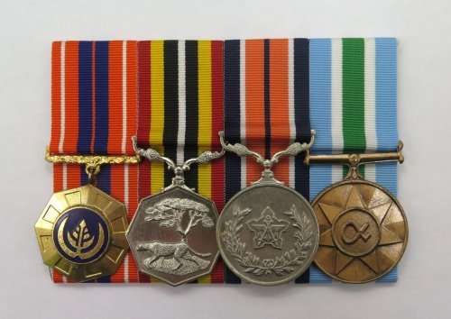 Full Size. Group of four Medals. To: Sgt A Bennet  4 SAI SA Army